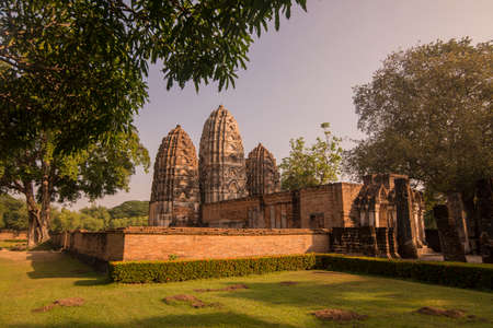 the Wat Si Sawai Temple at the Historical Park in Sukhothai in the Provinz Sukhothai in Thailand.   Thailand, Sukhothai, November, 2019のeditorial素材