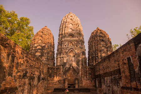 the Wat Si Sawai Temple at the Historical Park in Sukhothai in the Provinz Sukhothai in Thailand.   Thailand, Sukhothai, November, 2019のeditorial素材