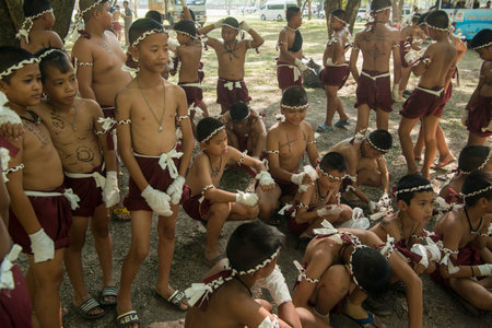 muay Thai boxing boys at the Loy Krathong Festival in the Historical Park in Sukhothai in the Provinz Sukhothai in Thailand.   Thailand, Sukhothai, November, 2019のeditorial素材