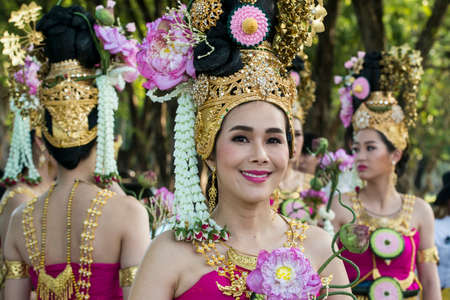 traditional dresst thai people at the Loy Krathong Festival in the Historical Park in Sukhothai in the Provinz Sukhothai in Thailand.   Thailand, Sukhothai, November, 2019のeditorial素材