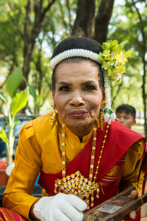 traditional dresst thai people at the Loy Krathong Festival in the Historical Park in Sukhothai in the Provinz Sukhothai in Thailand.   Thailand, Sukhothai, November, 2019のeditorial素材