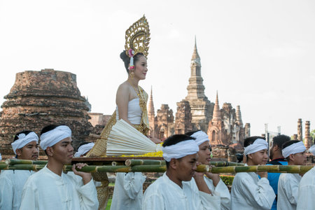 traditional dresst thai people at the Loy Krathong Festival in front of the Wat mahathat in the...