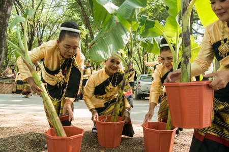 traditional dresst thai people at the Loy Krathong Festival in the Historical Park in Sukhothai in the Provinz Sukhothai in Thailand.   Thailand, Sukhothai, November, 2019のeditorial素材