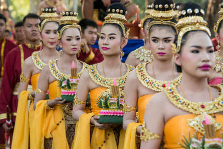 traditional dresst thai people at the Loy Krathong Festival in the Historical Park in Sukhothai in the Provinz Sukhothai in Thailand.   Thailand, Sukhothai, November, 2019のeditorial素材