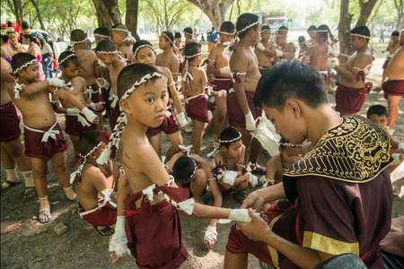 muay Thai boxing boys at the Loy Krathong Festival in the Historical Park in Sukhothai in the Provinz Sukhothai in Thailand.   Thailand, Sukhothai, November, 2019のeditorial素材