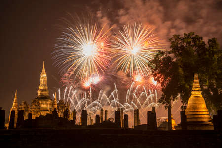 a firework on the Loy Krathong festival at the Wat Mahathat Temple at the Historical Park in Sukhothai in the Provinz Sukhothai in Thailand.   Thailand, Sukhothai, November, 2019のeditorial素材