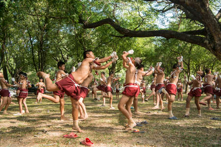 muay Thai boxing boys at the Loy Krathong Festival in the Historical Park in Sukhothai in the Provinz Sukhothai in Thailand.   Thailand, Sukhothai, November, 2019のeditorial素材