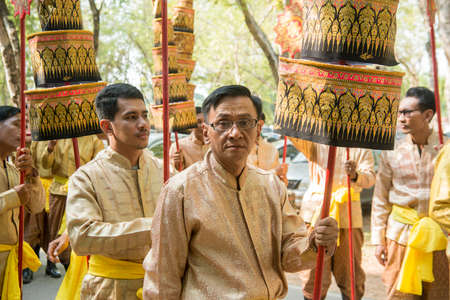 traditional dresst thai people at the Loy Krathong Festival in the Historical Park in Sukhothai in the Provinz Sukhothai in Thailand.   Thailand, Sukhothai, November, 2019のeditorial素材