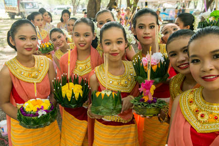 traditional dresst thai people at the Loy Krathong Festival in the Historical Park in Sukhothai in the Provinz Sukhothai in Thailand.   Thailand, Sukhothai, November, 2019のeditorial素材