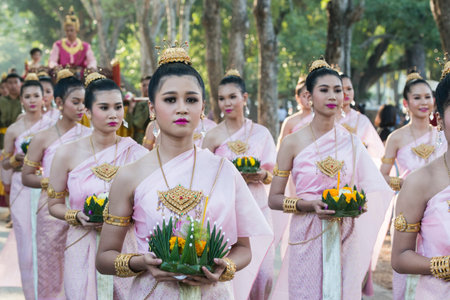 traditional dresst thai people at the Loy Krathong Festival in the Historical Park in Sukhothai in...