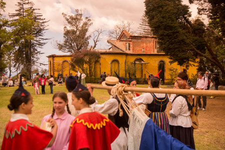 People in traditional dress in front of the Quinta Jardins do Imperador on the reopening of the...