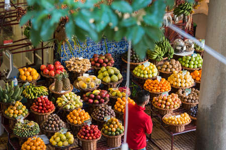 tropical fruits at the Mercado dos Lavradores in the city centre of Funchal on the Island Madeira of Portugal.   Portugal, Madeira, April 2018のeditorial素材