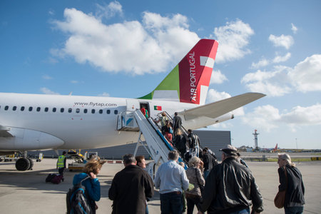 a airplane of TAP on thel Airport in Lisbon of Portugal.   Portugal, Madeira, April 2018