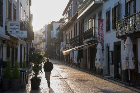 a street in the city centre of Funchal on the Island Madeira of Portugal.   Portugal, Madeira, April 2018のeditorial素材