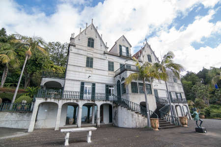 the Hotel Monte Palace in the Jardim Tropical or Tropical Garden in the city centre of Funchal on the Island Madeira of Portugal.   Portugal, Madeira, April 2018のeditorial素材
