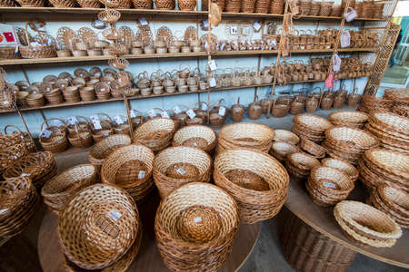 Basket weave work at the Cafe Relogio ad Shop of Arema in the town of Camacha in east Madeira on the Island Madeira of Portugal.   Portugal, Madeira, April 2018のeditorial素材