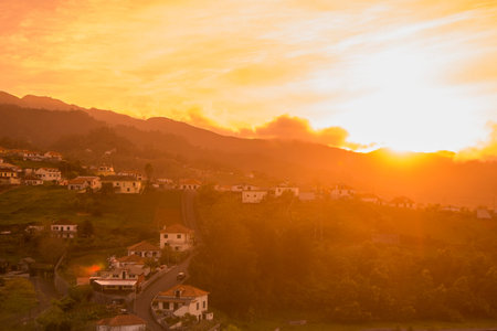 a view of a park and the centre of the town Santana in North of the Island Madeira of Portugal.   Portugal, Madeira, April 2018のeditorial素材