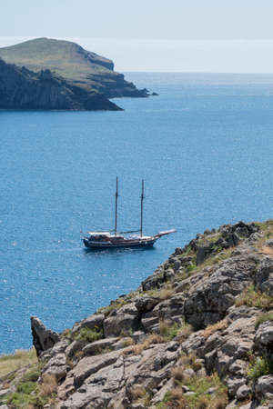 a sailboat in the landscape of the Ponta de Sao lourenco near the Town of Canical on the coast at east Madeira on the Island Madeira of Portugal.   Portugal, Madeira, April 2018のeditorial素材