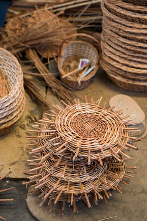Basket weave work at the Cafe Relogio ad Shop of Arema in the town of Camacha in east Madeira on the Island Madeira of Portugal.   Portugal, Madeira, April 2018のeditorial素材