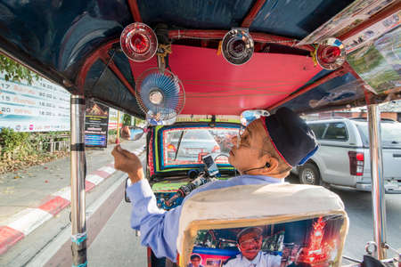 a tuk tuk driver in the city of Chiang Rai in North Thailand.  Thailand, Chiang Rai, November, 2019のeditorial素材