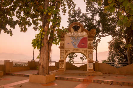 a gate at the Wat Phra That Phu Khao at the Mekong River in the town of Sop Ruak in the golden triangle in the north of the city Chiang Rai in North Thailand.   Thailand, Chiang Sean, November, 2019のeditorial素材