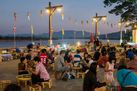 street food at a Satuday night market at the mekong river in the town of Chiang Saen in the north of the city Chiang Rai in North Thailand.   Thailand, Chiang Sean, November, 2019のeditorial素材