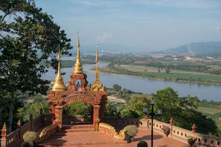 the Wat Phra Borommathat at the Temple Wat Phra That Pha Ngao in the town of Chiang Saen at the mekong River in the golden triangle in the north of the city Chiang Rai in North Thailand.   Thailand, Chiang Sean, November, 2019のeditorial素材
