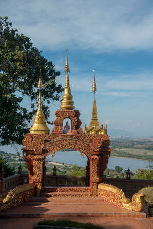 the Wat Phra Borommathat at the Temple Wat Phra That Pha Ngao in the town of Chiang Saen at the mekong River in the golden triangle in the north of the city Chiang Rai in North Thailand.   Thailand, Chiang Sean, November, 2019のeditorial素材