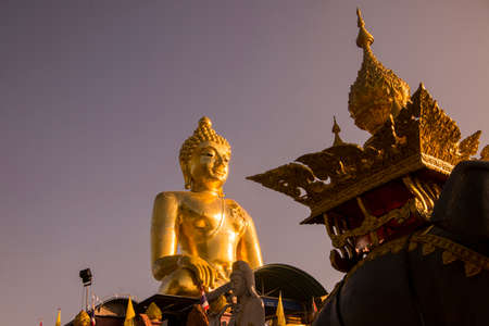 the Giant Buddha on the Dragon Boat Temple at the Mekong River in the town of Sop Ruak in the golden triangle in the north of the city Chiang Rai in North Thailand.   Thailand, Chiang Sean, November, 2019のeditorial素材