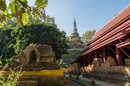 the wat Phra That Chedi Luang in the town of Chiang Saen in the north of the city Chiang Rai in North Thailand.   Thailand, Chiang Sean, November, 2019のeditorial素材