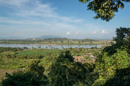 a sunset at the mekong river in the town of Chiang Saen in the north of the city Chiang Rai in North Thailand.   Thailand, Chiang Sean, November, 2019のeditorial素材