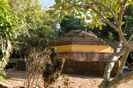 a old chedi ruin at the Uposatha Hall near of Wat Phra Borommathat in the town of Chiang Saen at the mekong River in the golden triangle in the north of the city Chiang Rai in North Thailand.   Thailand, Chiang Sean, November, 2019のeditorial素材