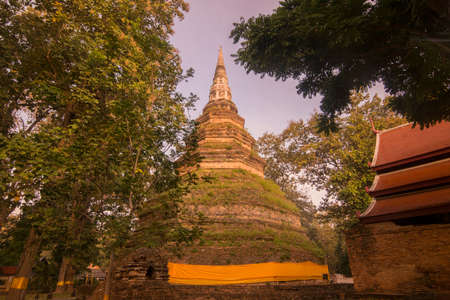 the wat Phra That Chedi Luang in the town of Chiang Saen in the north of the city Chiang Rai in North Thailand.   Thailand, Chiang Sean, November, 2019のeditorial素材