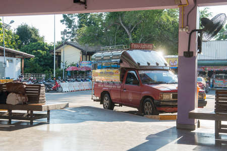 a minivan or Sorng taa ou Transport at the Bus Station in the town of Tak in the Province of Tak in Thailand.   Thailand, Tak, November, 2019のeditorial素材