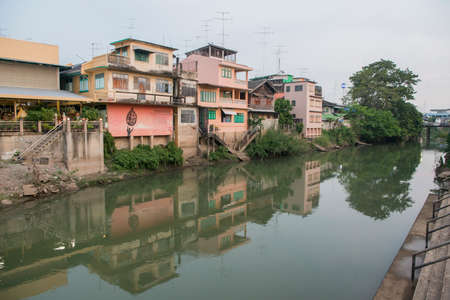 the Mae nam Phetchaburi River in the old Town in the city of Phetchaburi or Phetburi in the province of Phetchaburi in Thailand.   Thailand, Phetburi, November, 2019のeditorial素材