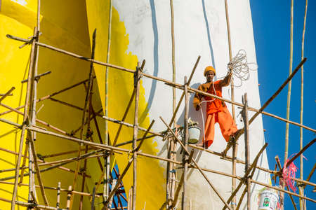 the Big buddha in construction at the Wat Phusawan in the Town of Chiang Khong in the province of Chiang Raii in Thailand.   Thailand, Chiang Khong, November, 2019のeditorial素材