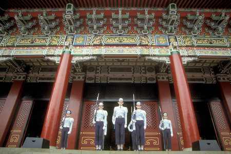 a guard at the Chiang Kai Shek Memorial Hall in the city centre of Taipei in Taiwan of East Aasia.  ...