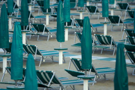 umbrellas or parasol at a public beach in Rimini in Emilia-Romagna in Italy.   Italy, Rimini, June, 2001のeditorial素材
