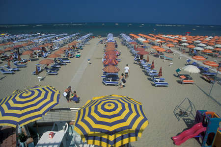 umbrellas or parasol at a public beach in Rimini in Emilia-Romagna in Italy.   Italy, Rimini, June, 2001のeditorial素材