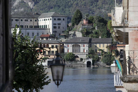 The Isla San Giulio in the Orta Lake near the Fishingvillage of Orta on the Lake Orta in Piemont in north Italy.  Italy, Piemont, October, 2011のeditorial素材