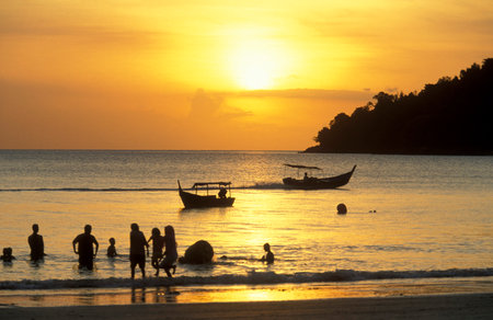a sunset at the the Beach of the Town of Kampung Lubok Buaya and Pantai Cenang Beach on the Island of Langkawi in Malaysia.  Malaysia, Langkawi, January, 2003のeditorial素材