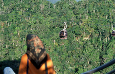 a cable car at the jungle Landscape at the Mountain area of Gunung Machinchang on the Island of Langkawi in Malaysia.  Malaysia, Langkawi, January, 2003のeditorial素材
