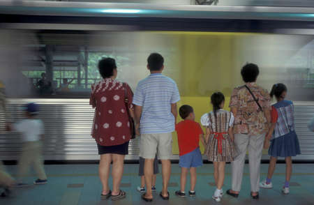 people at a metro station in the city of Kuala Lumpur in Malaysia.  Malaysia, Kuala Lumpur, August, 1997のeditorial素材