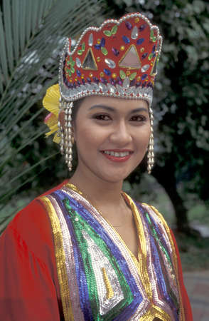 Women in traditional malay dress in the city of Kuala Lumpur in Malaysia.  Malaysia, Kuala Lumpur, August, 1997のeditorial素材