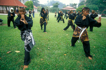 a women at a martial art and sport in the city of Kuala Lumpur in Malaysia.  Malaysia, Kuala Lumpur, January, 2003のeditorial素材
