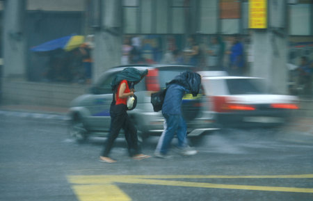 tropical Rain fall in the city of Kuala Lumpur in Malaysia.  Malaysia, Kuala Lumpur, January, 2003のeditorial素材