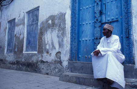 people in the Old Town of Stone Town on the Island of Zanzibar in Tanzania.  Tanzania, Zanzibar, Stone Town, October, 2004のeditorial素材
