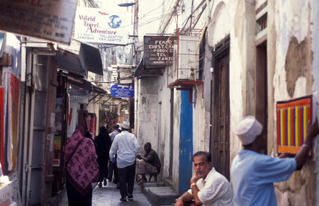Shops in a alley in the Old Town of Stone Town on the Island of Zanzibar in Tanzania.  Tanzania, Zanzibar, Stone Town, October, 2004のeditorial素材