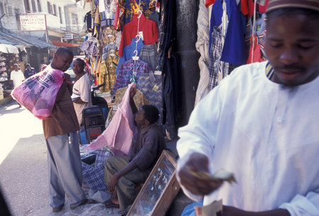 Shops in a alley in the Old Town of Stone Town on the Island of Zanzibar in Tanzania.  Tanzania, Zanzibar, Stone Town, October, 2004のeditorial素材