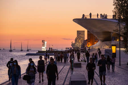 sunset at the promenade with the MAAT and the monument of Discoveries or Pedaro dos Descobrimentos in Belem near the City of Lisbon in Portugal.  Portugal, Lisbon, October, 2021のeditorial素材